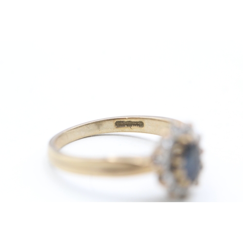 43 - 9ct gold diamond and sapphire halo ring (2.5g) Size  M