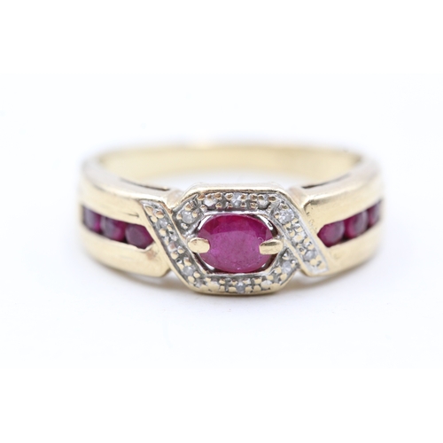 50 - 9ct gold ruby and diamond twist channel setting ring (3.9g) Size  P