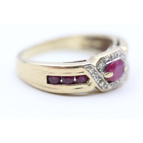 50 - 9ct gold ruby and diamond twist channel setting ring (3.9g) Size  P