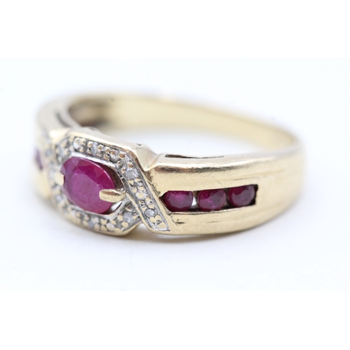 50 - 9ct gold ruby and diamond twist channel setting ring (3.9g) Size  P