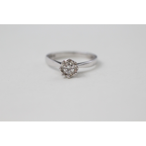 57 - 18ct white gold illusion set diamond solitaire ring (2.7g) Size  N