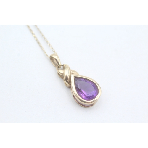 66 - 9ct gold pear cut amethyst pendant necklace (2.1g)