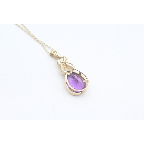 66 - 9ct gold pear cut amethyst pendant necklace (2.1g)