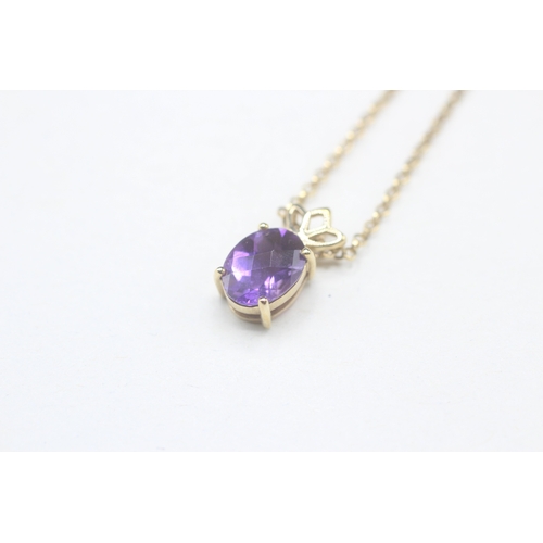 67 - 9ct gold oval cut amethyst pendant necklace (2.6g)