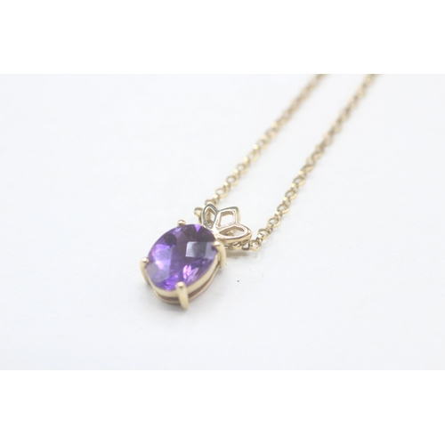 67 - 9ct gold oval cut amethyst pendant necklace (2.6g)