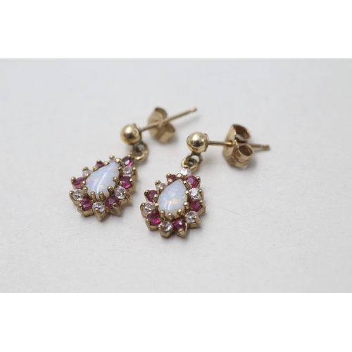 73 - 9ct gold opal, ruby and white gemstone earrings (1.7g)