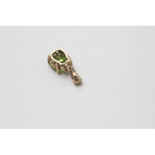 79 - 9ct gold diamond and peridot drop pendant (0.8g)