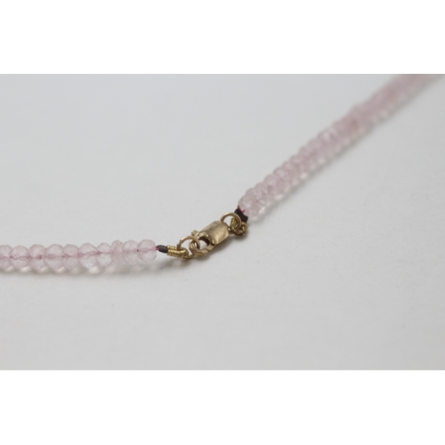 81 - 9ct gold rose quartz beaded necklace (10.2g)