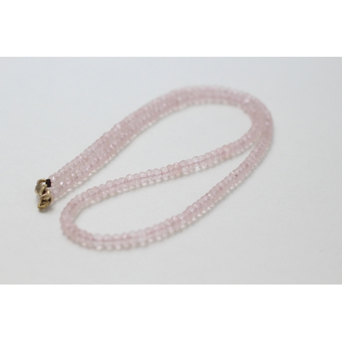 81 - 9ct gold rose quartz beaded necklace (10.2g)