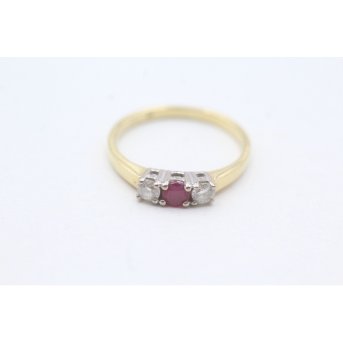 103 - 18ct gold ruby & diamond three stone ring (2.7g) Size O 1/2