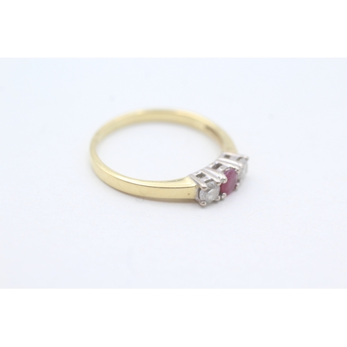 103 - 18ct gold ruby & diamond three stone ring (2.7g) Size O 1/2