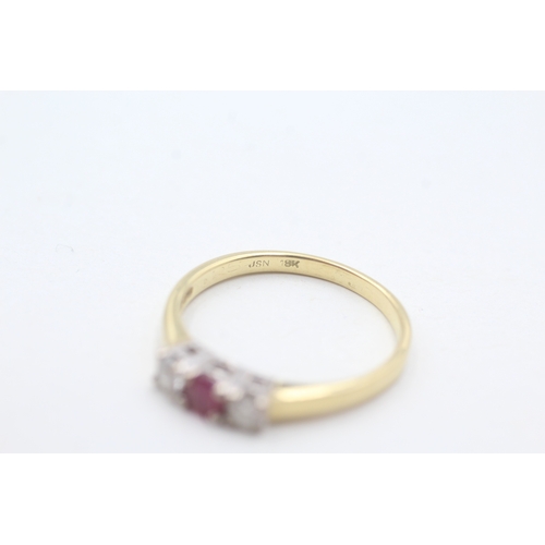 103 - 18ct gold ruby & diamond three stone ring (2.7g) Size O 1/2