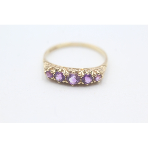 107 - 9ct gold amethyst five stone ring with patterned gallery (2.2g) Size S 1/2