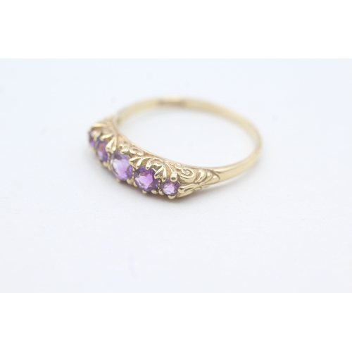 107 - 9ct gold amethyst five stone ring with patterned gallery (2.2g) Size S 1/2