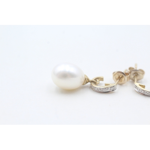 109 - 9ct gold cultured pearl & diamond drop earrings (3.6g)