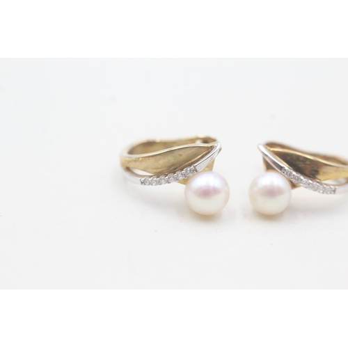 112 - 9ct gold cultured pearl & diamond earrings (3.1g)