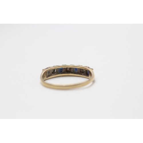 12 - 9ct gold 1970's sapphire & diamond half eternity ring (2.1g) Size P 1/2