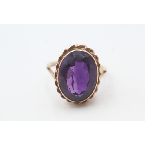 124 - 9ct gold vintage amethyst dress ring (4.8g) Size N