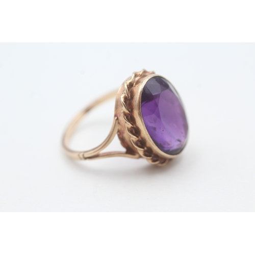 124 - 9ct gold vintage amethyst dress ring (4.8g) Size N