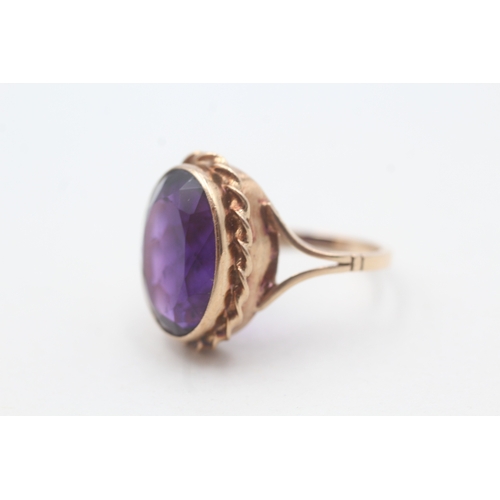 124 - 9ct gold vintage amethyst dress ring (4.8g) Size N