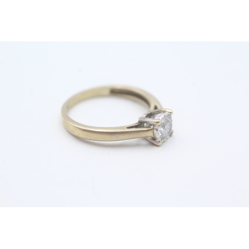 129 - 9ct gold diamond solitaire ring (2.2g) Size L