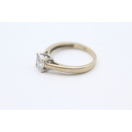 129 - 9ct gold diamond solitaire ring (2.2g) Size L