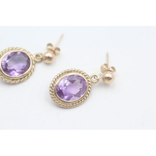 131 - 9ct gold amethyst drop earrings (2.4g)