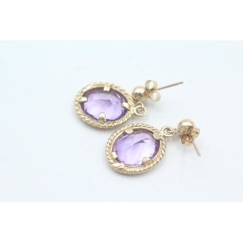 131 - 9ct gold amethyst drop earrings (2.4g)