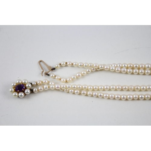 132 - 9ct gold vintage cultured pearl two row necklace with a pearl & amethyst claps (26g)