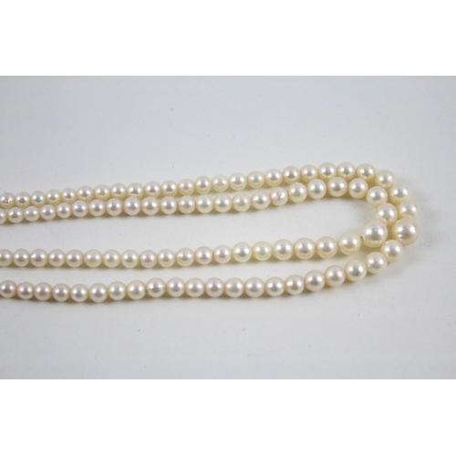 132 - 9ct gold vintage cultured pearl two row necklace with a pearl & amethyst claps (26g)