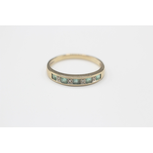 154 - 9ct gold emerald and diamond channel setting ring (1.6g) Size O