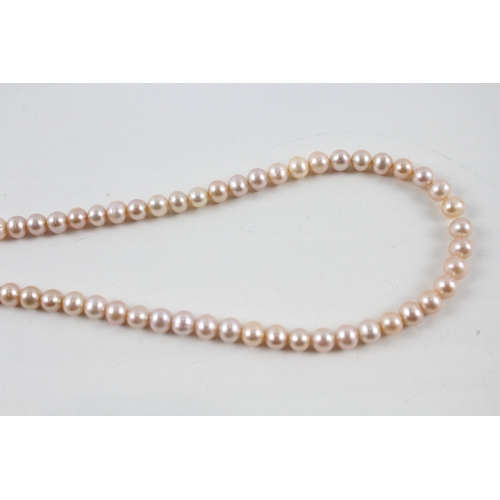 177 - 9ct gold peach cultured pearl necklace (27g)