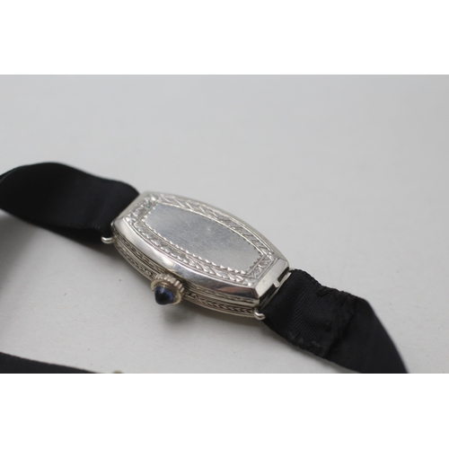 182 - 18ct gold diamond and sapphire watch head on fabric strap (10g)