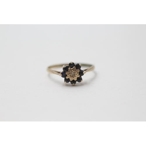 187 - 9ct gold diamond and sapphire halo ring (1.1g) Size M