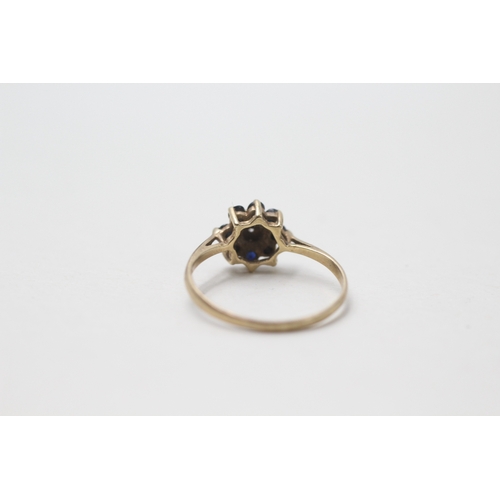 187 - 9ct gold diamond and sapphire halo ring (1.1g) Size M