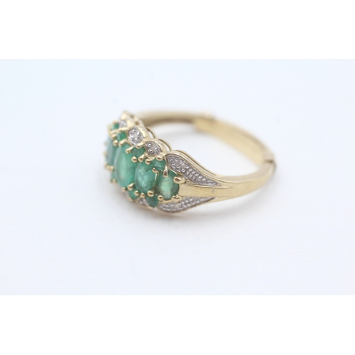 192 - 9ct gold emerald & diamond dress ring (3.6g) Size P