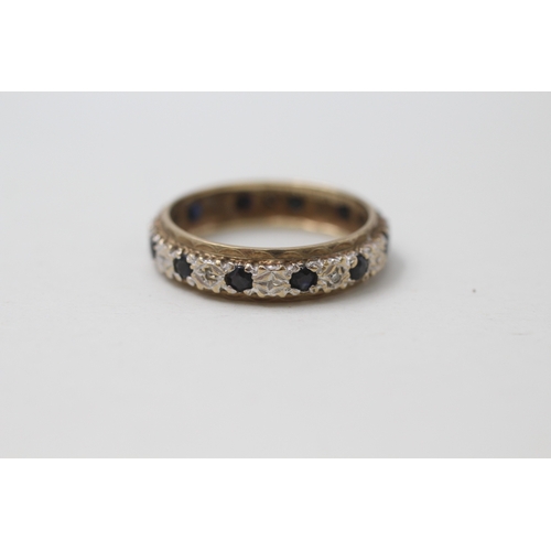 194 - 9ct gold sapphire & diamond full eternity ring (2.6g) Size P