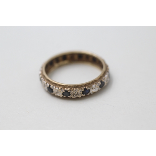 194 - 9ct gold sapphire & diamond full eternity ring (2.6g) Size P