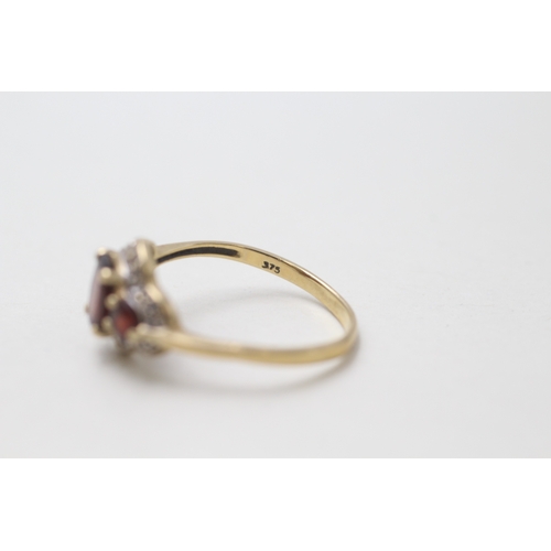 195 - 9ct gold garnet & diamond dress ring (1.9g) AS SEEN - MISSHAPEN Size O