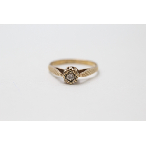 33 - 9ct gold solitaire diamond ring (1.3g) Size J 1/2