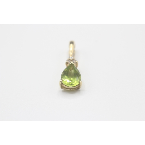 39 - 9ct gold peridot and diamond tear drop pendant (1.4g)