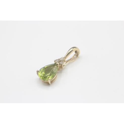 39 - 9ct gold peridot and diamond tear drop pendant (1.4g)