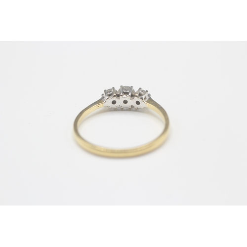 41 - 18ct gold diamond three stone ring (1.8g) Size M 1/2