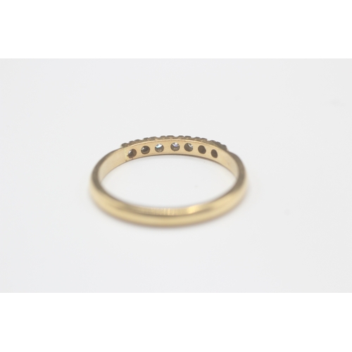 43 - 18ct gold diamond half eternity ring (2.6g) Size Q