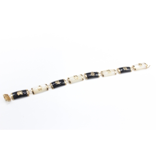 50 - 14ct gold mother of pearl & black onyx bracelet with chinese symbols (10.5g)