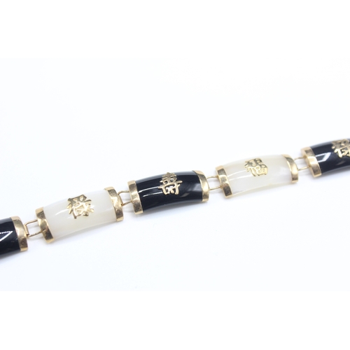 50 - 14ct gold mother of pearl & black onyx bracelet with chinese symbols (10.5g)