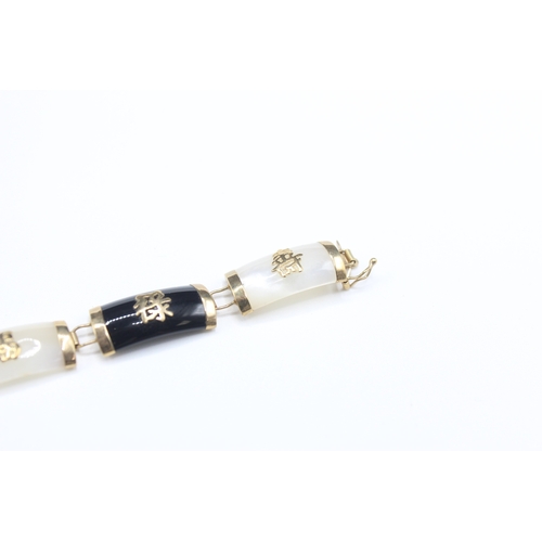 50 - 14ct gold mother of pearl & black onyx bracelet with chinese symbols (10.5g)