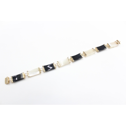 50 - 14ct gold mother of pearl & black onyx bracelet with chinese symbols (10.5g)