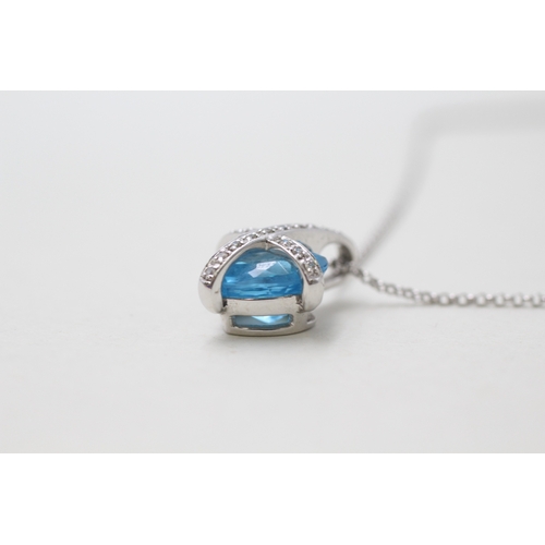 54 - 9ct gold blue topaz & diamond pendant necklace (3.8g)