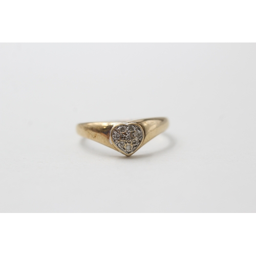 67 - 9ct gold pave set diamond heart shape ring (1.6g) Size O